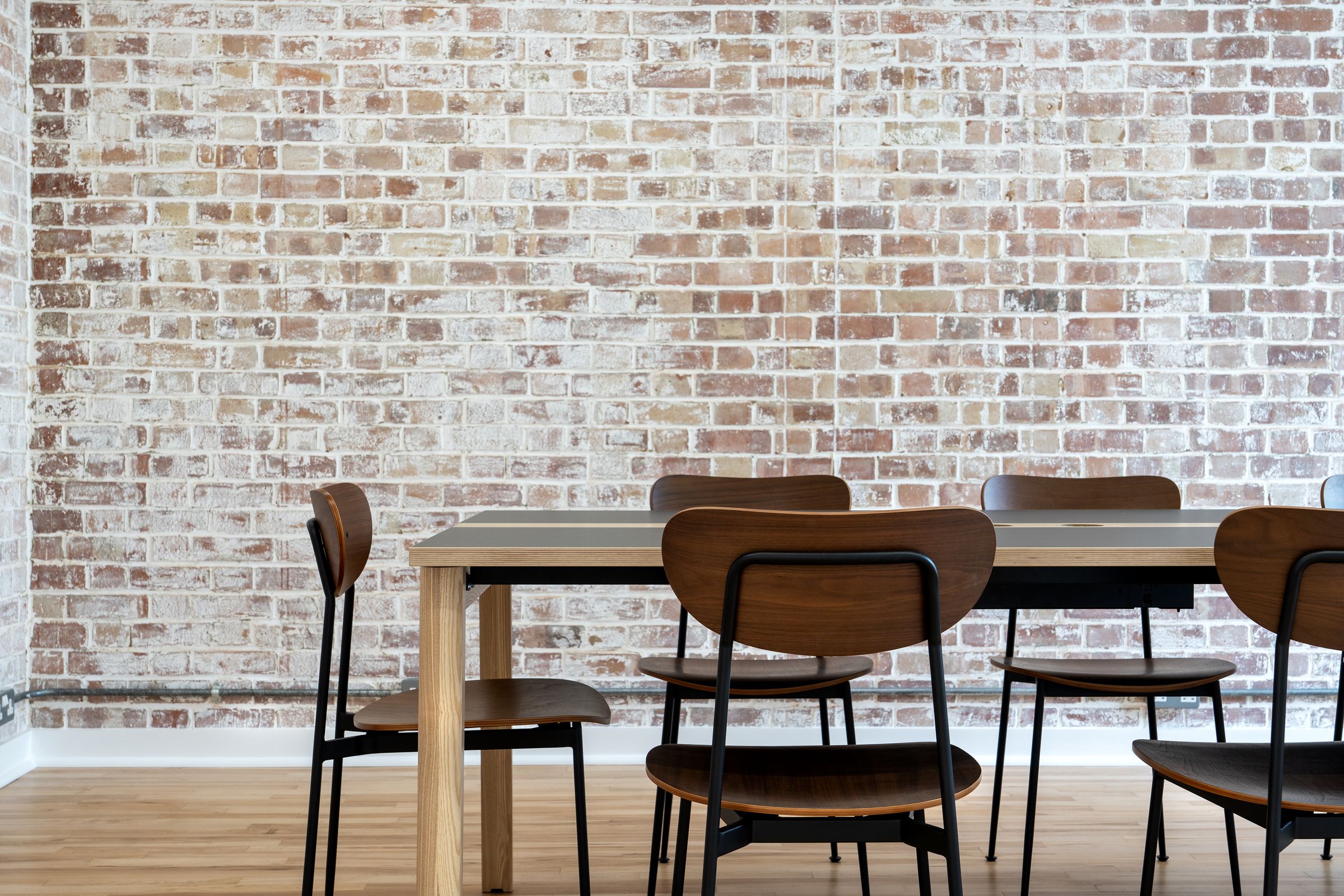 Original brickwork retained in the refurbished interior