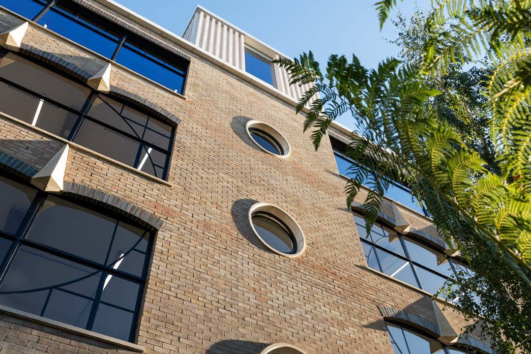 Exterior detail, brick facade with porthole windows